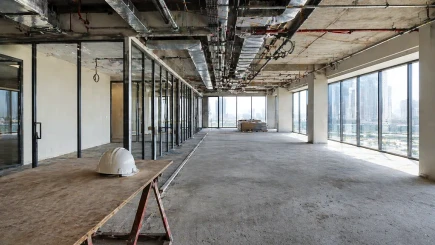 Open-plan UAE office fit-out in progress, with the division between completed and uncompleted areas representing the governance gap that forms when project decision accountability is unclear.